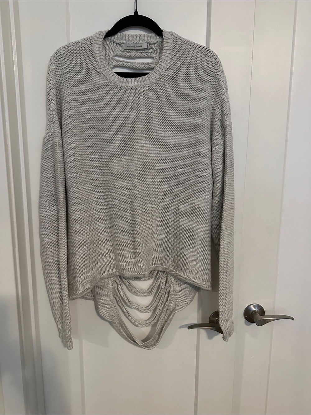 Sweater with unique open back design